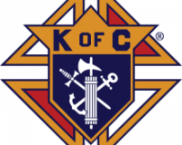 Knights of Columbus logo, coat of arms with the letters K of C on top.