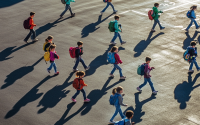 AI image of children crossing parking lot dressed for school.